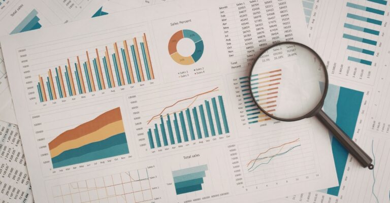A collection of colorful business charts and graphs