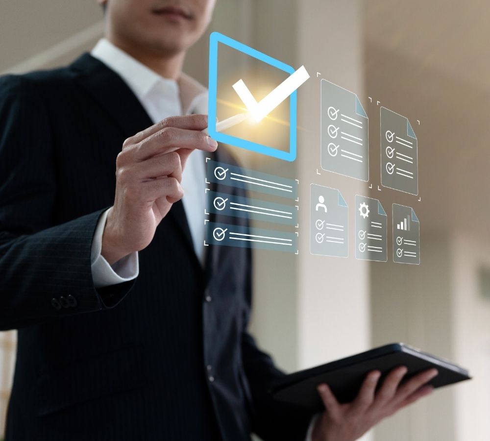 Businessperson in a suit interacts with a glowing virtual checklist icon